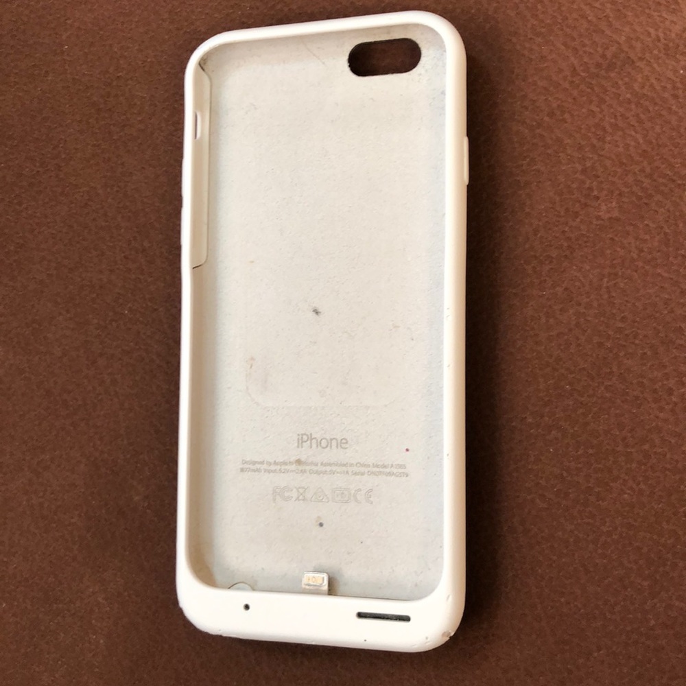 white apple charging case